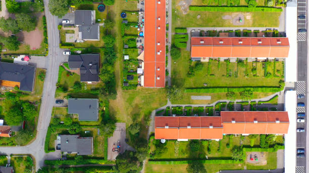 istock Top view, flying over idyllic villa area 1166094856