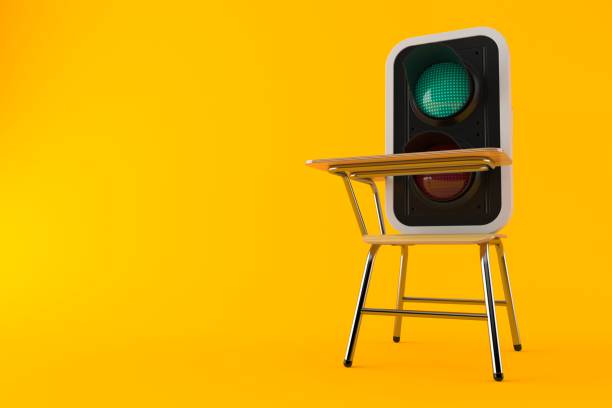 istock Green traffic light on school chair 1166097430