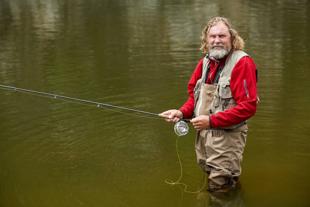 istock Flyfishing in forest during eco-tourism. 1166097593