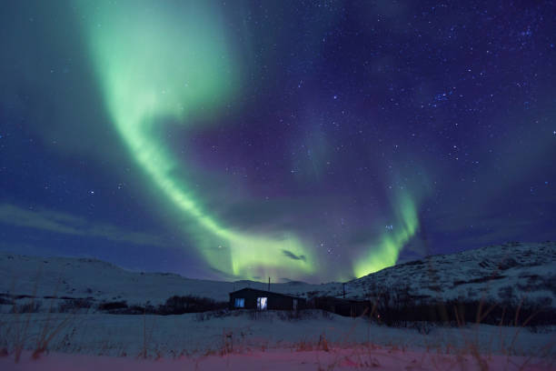 Northern Lights or Aurora Borealis. Kola Peninsula winter landscape