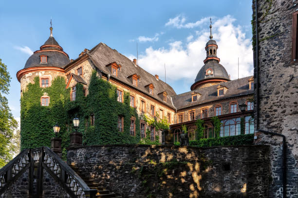 Laubach castle on a beautiful summer day, GermanyLaubach, Germany, 08/03/2019: The castle Laubach, consisting of the castle complex and a large park, invites tourists to spend the day there. Numerous events take place from spring to autumn.