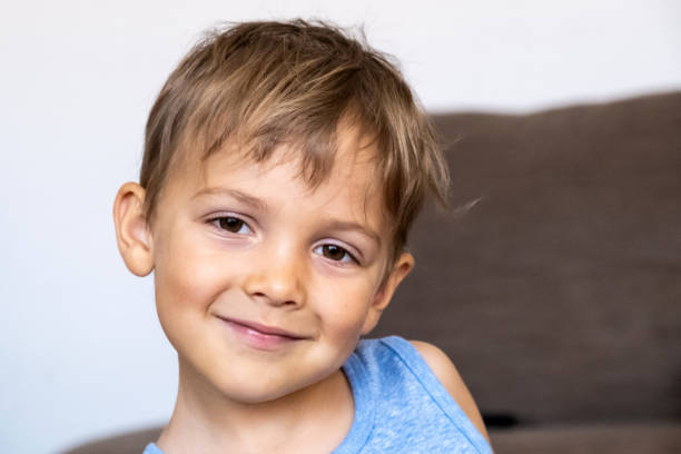 istock Three years old child boy looking at the camera 1166100917