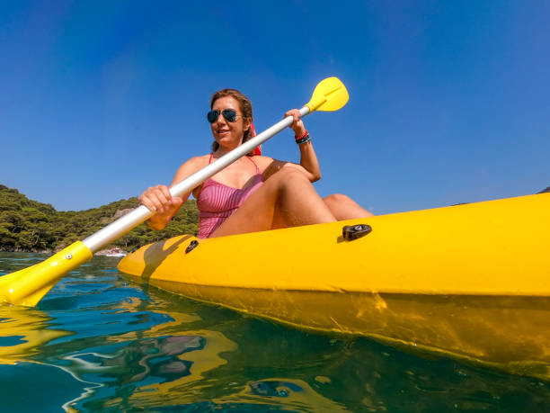 istock Woman on canoe. 1166105460