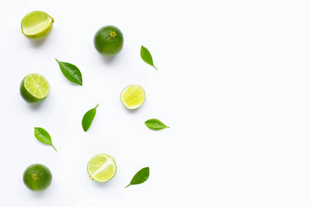 istock Limes with leaves isolated on white background. 1166105486