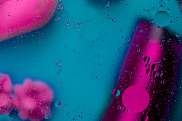 istock Micro molecular abstract pattern of colored oil bubbles on water. 1166109415