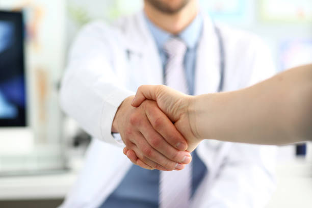 istock Doctor and patient handshake 1166110689