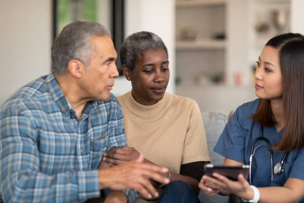istock Sharing results with an elderly couple 1166110700