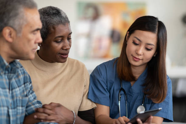 istock Sharing results with an elderly couple 1166110710