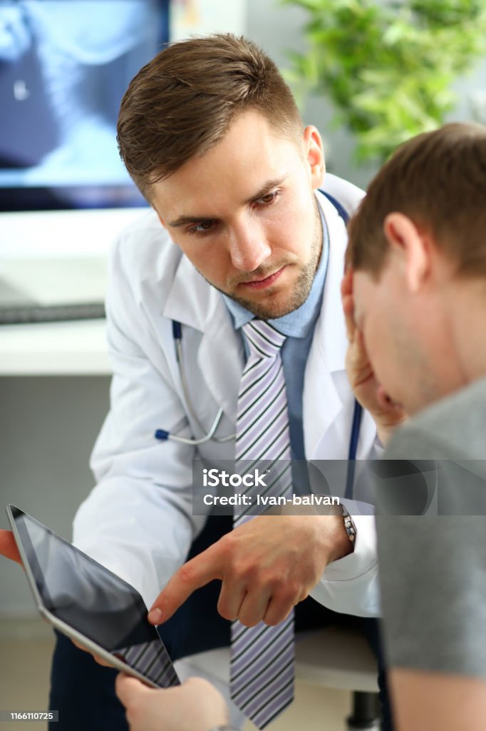 Sad Doc Sad Patient At Doctors Cabinet Stock Photo - Download Image Now - Adult ...