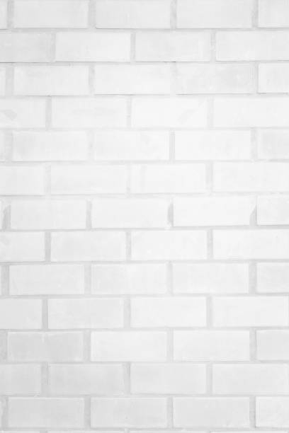 istock Abstract old stucco texture white brick wall background in rural room, wallpaper. 1166110756