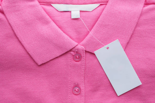 istock Blank white clothes tag label on new shirt 1166111017