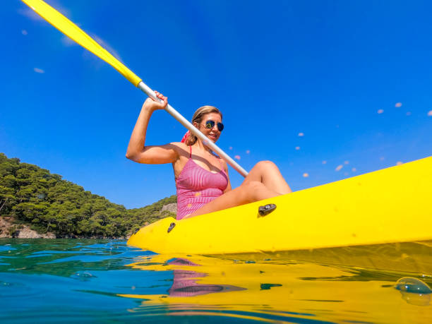 istock Woman on canoe. 1166111075