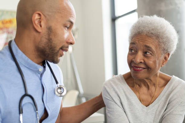 istock Doctor showing his patient their results 1166111145