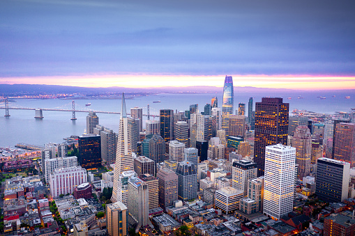 Colorful aerial panorama of San Francisco financial district and SOMA at sunrise. California, USA
