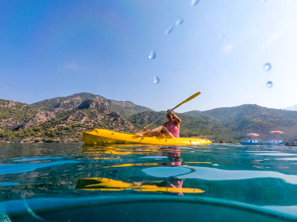 istock Woman on canoe. 1166118714