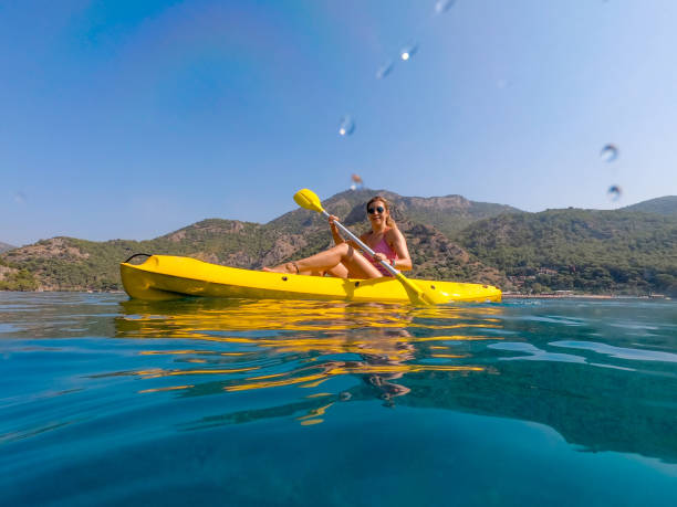 istock Woman on canoe. 1166120850