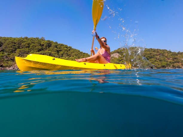 istock Woman on canoe. 1166120878