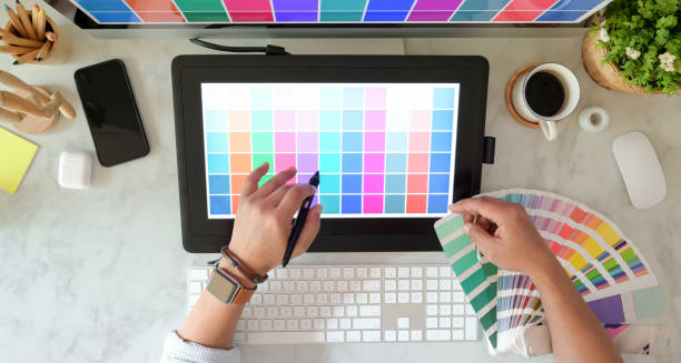 istock Top view of male creative graphic designer working 1166123324
