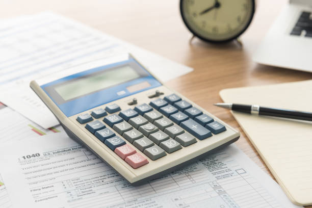 istock Calculator on the desk 1166123329