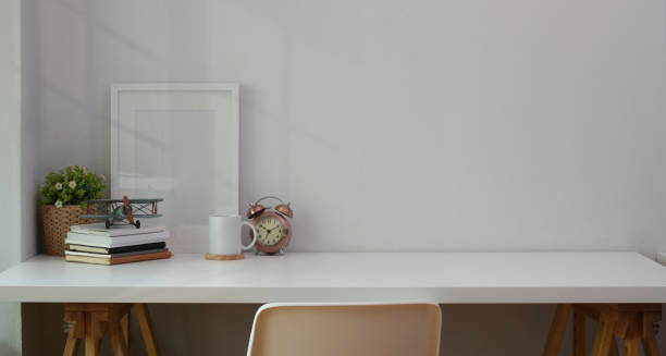 istock Minimal comfortable workplace with office supplies 1166123336