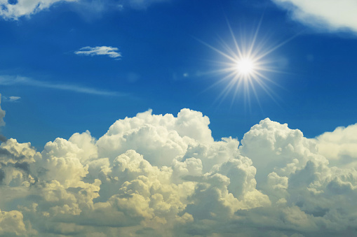 sun and white cloud with blue sky background