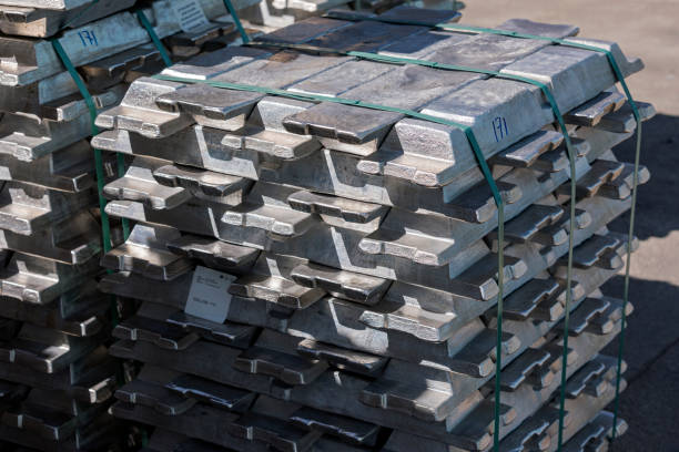 istock Billets or ingots of raw aluminium products.  Hoopes process involves the electrolysis of molten aluminium with a sodium, barium, and aluminium fluoride electrolyte. 1166127307