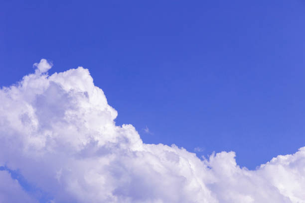 istock Blue sky and white clouds, rain clouds on sunny summer or spring day. 1166128231