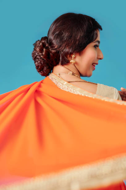 istock Beautiful dancing Indian woman 1166129157