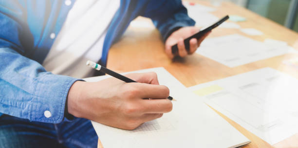 istock Young male UI designer working in office 1166130054