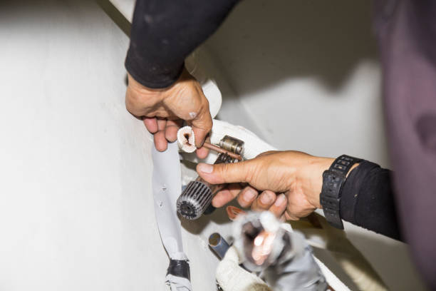 istock air conditioner mechanic Copper pipe welding 1166136017