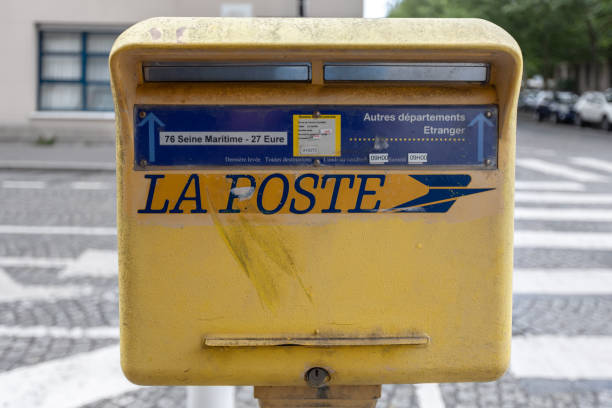 Bayeux, France. August 1st, 2019: Yellow La Poste Mailbox in France