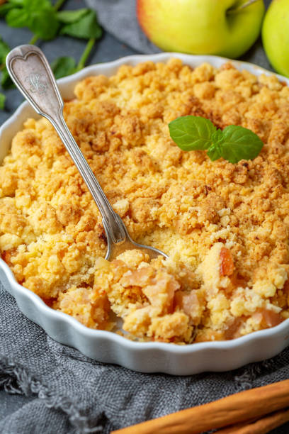 istock Apple crumble and a dessert spoon closeup. 1166139655