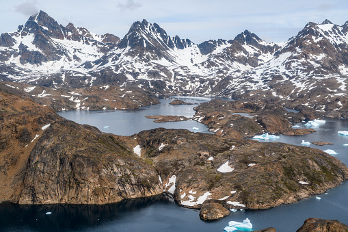 View over fjords between Tasiilaq and Kulusuk Island in southeastern Greenland.