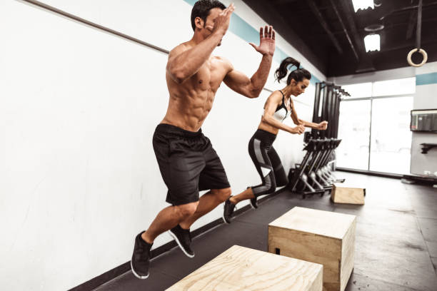 istock box squat at the gym 1166141865