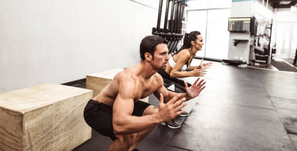 istock box squat at the gym 1166142042