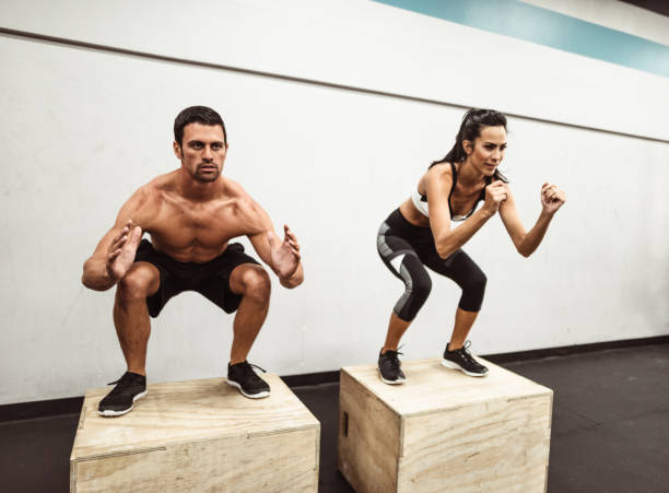 istock box squat at the gym 1166142115