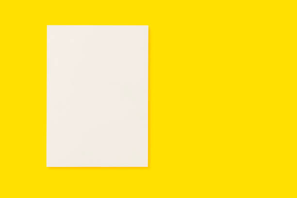 istock Blank white cover magazine on yellow background 1166142738