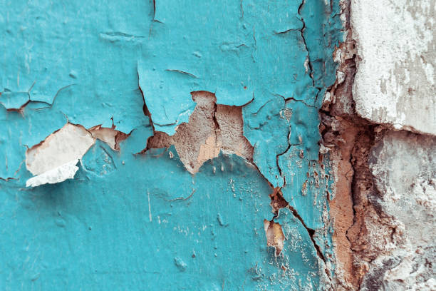 istock Texture of cracked blue and brown wall background. 1166145831