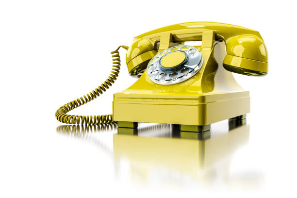 istock old yellow dial-up phone 1166147793