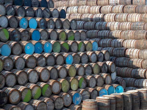 istock Whiskey Barrels stacked outside a Cooperage 1166150246