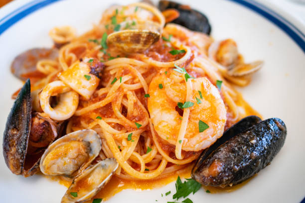 istock Pescatora with seafood. Pasta with seafood and tomato sauce. 1166150590