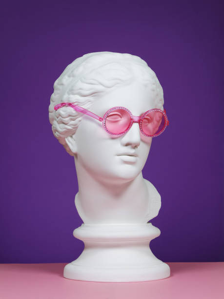 istock Plaster head with pink eyeglasses 1166150665