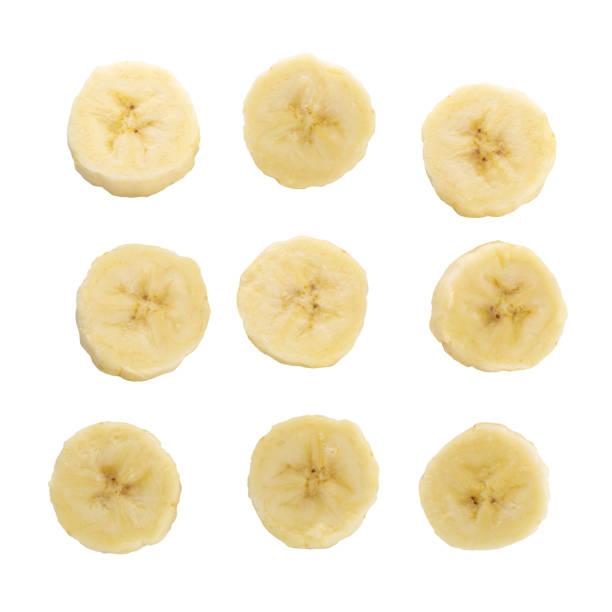istock Peeled banana slices isolated over a white background. 1166151557