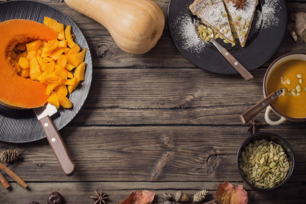 istock pumpkin dishes on wooden background 1166152217