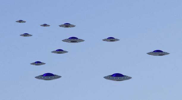 istock many UFO in the sky,The alien space ship ,UFO,3d render. 1166153362