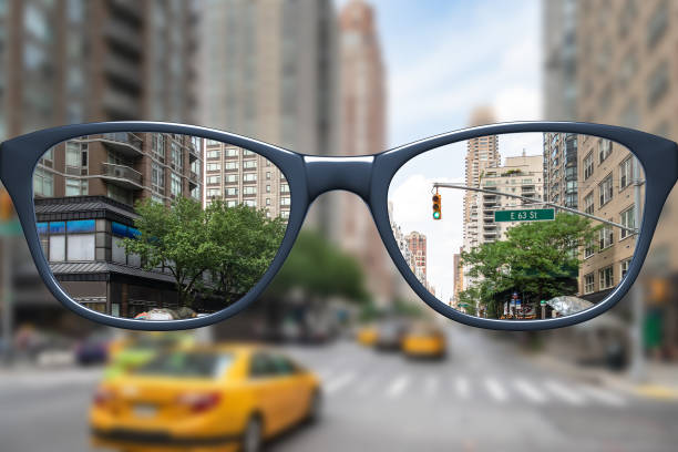 istock glasses with sharp and blurred big city 1166154150
