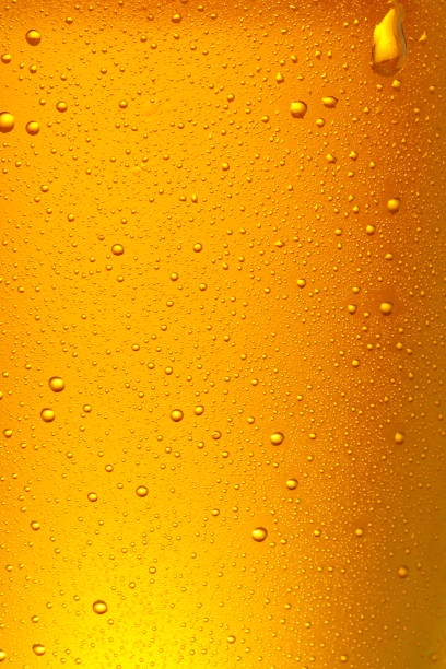 istock Beer Background. Ice Cold Beer Glass With Water Drops Condensation Close up. 1166155123