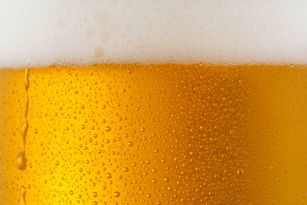 istock Beer Background. Ice Cold Beer Glass With Water Drops Condensation 1166155311