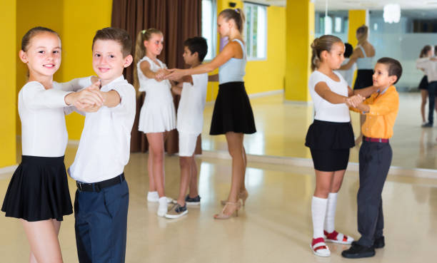 istock Kids are dancing waltz 1166159054