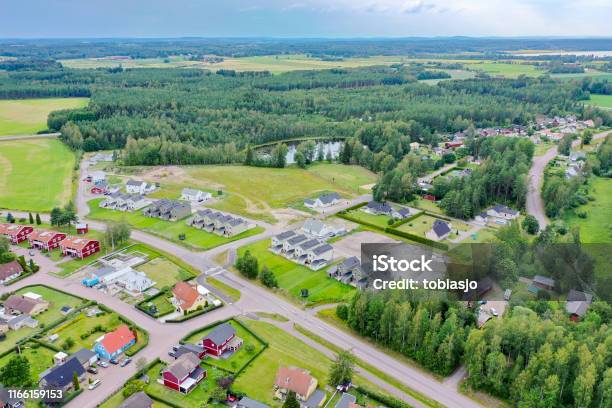 Residential Houses Surrounded By Green Landscape Stock Photo - Download Image Now - Denmark, Norway, Real Estate
